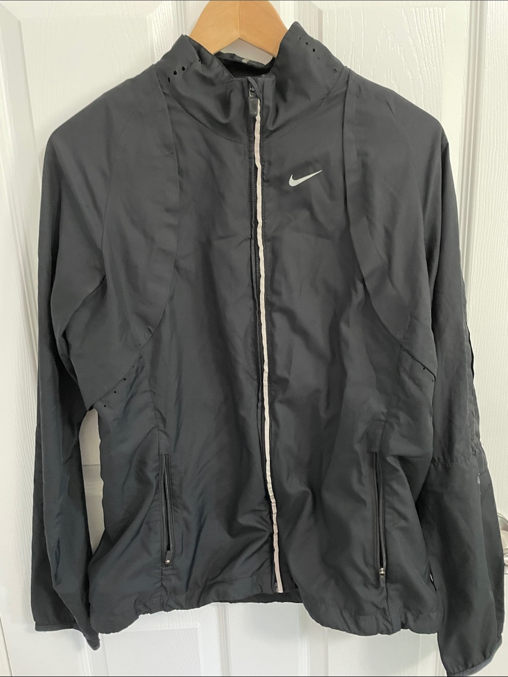 Nike women’s Black Windbreaker Jacket with Reflective Swoosh